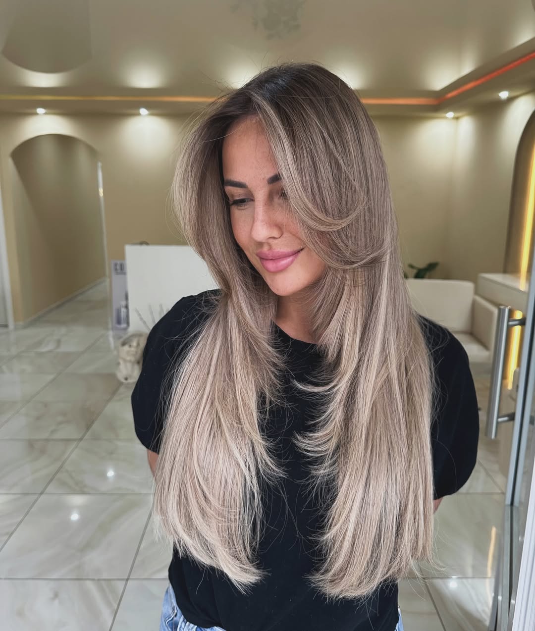 Fluffy Layers And Ash Blonde Balayage