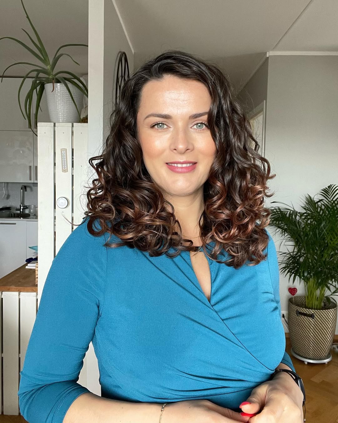 Glamorous Brunette Curls With Subtle Auburn Highlights