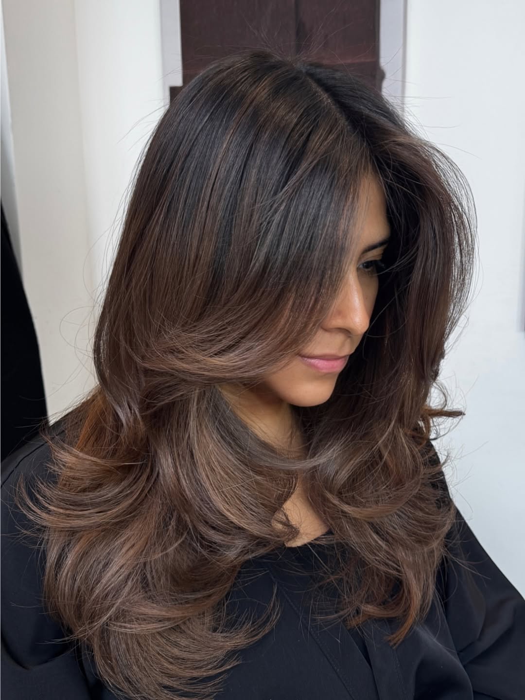 Glamorous Brunette Feathered Layers With Volume