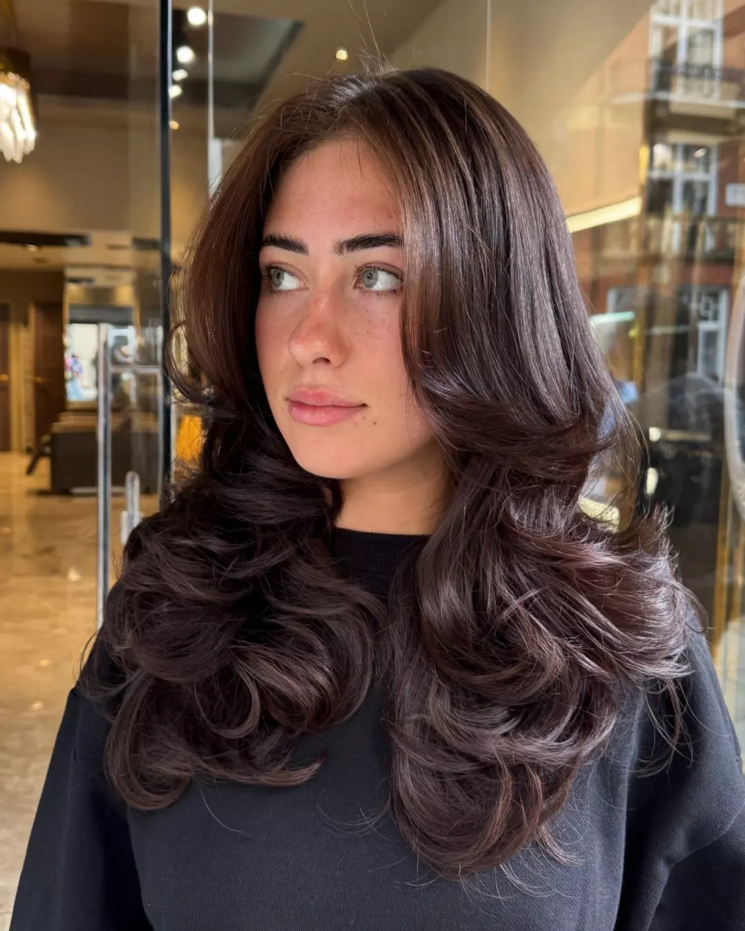 Glamorous Chocolate Brunette Blowout With Face-Framing Layers