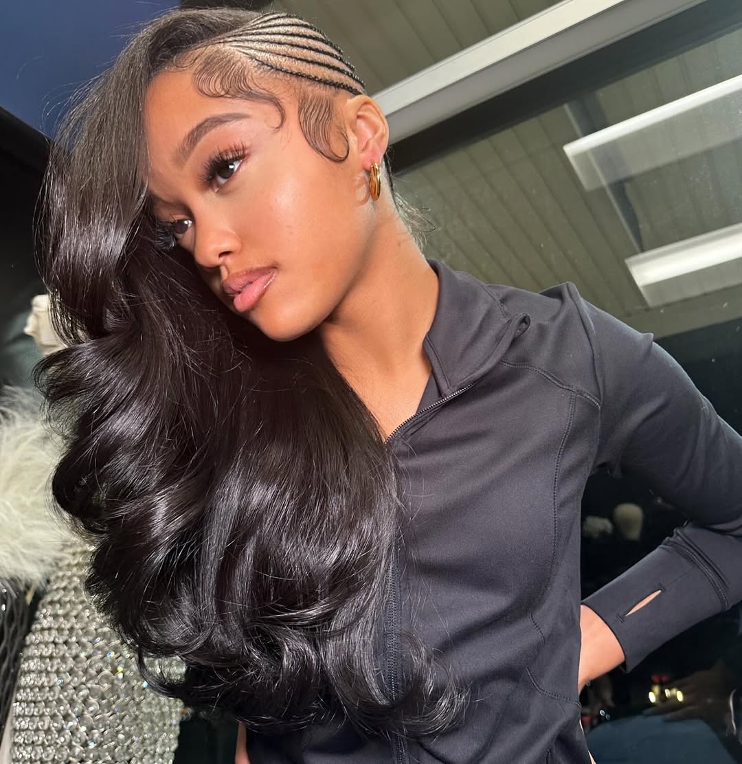 Glamorous Slicked-Back Cornrows With Voluminous Waves