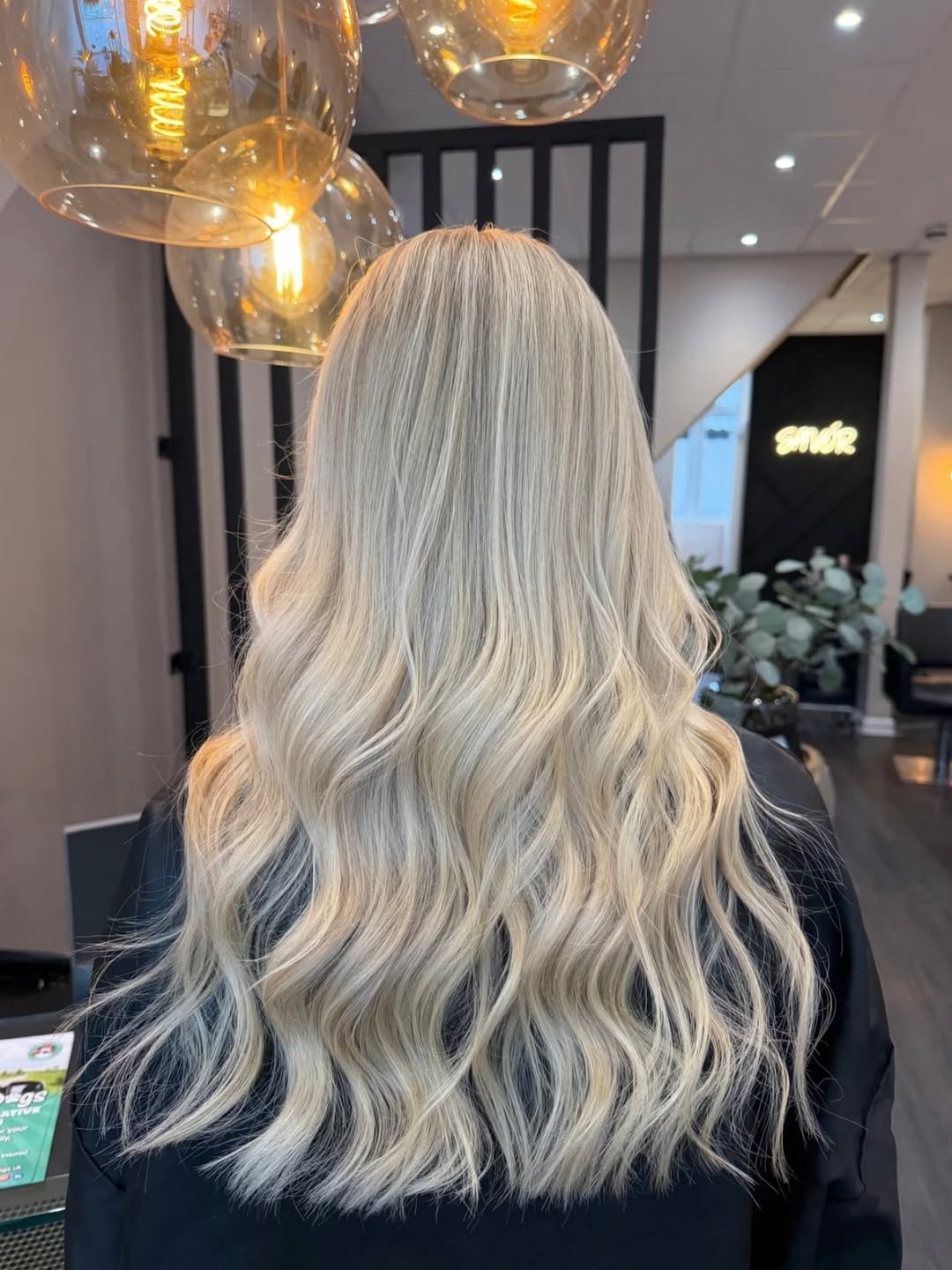 Glamorous Wavy Platinum Blonde Layers With Root Smudge