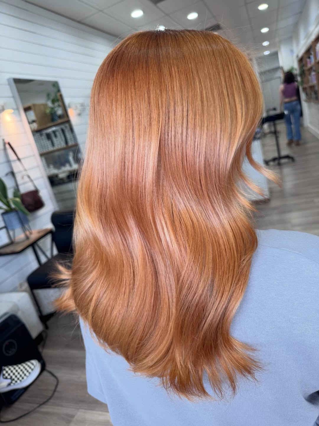 Glossy Strawberry Blonde Wavy Mid-Length Hair