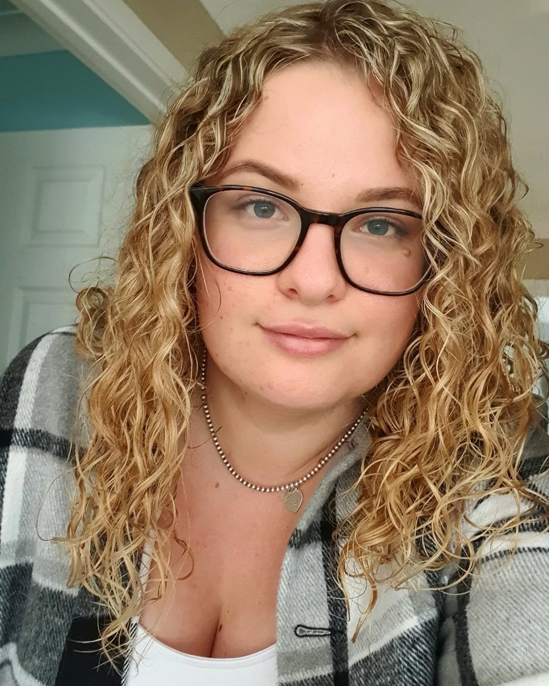 Golden Blonde Defined Curls Shoulder Length