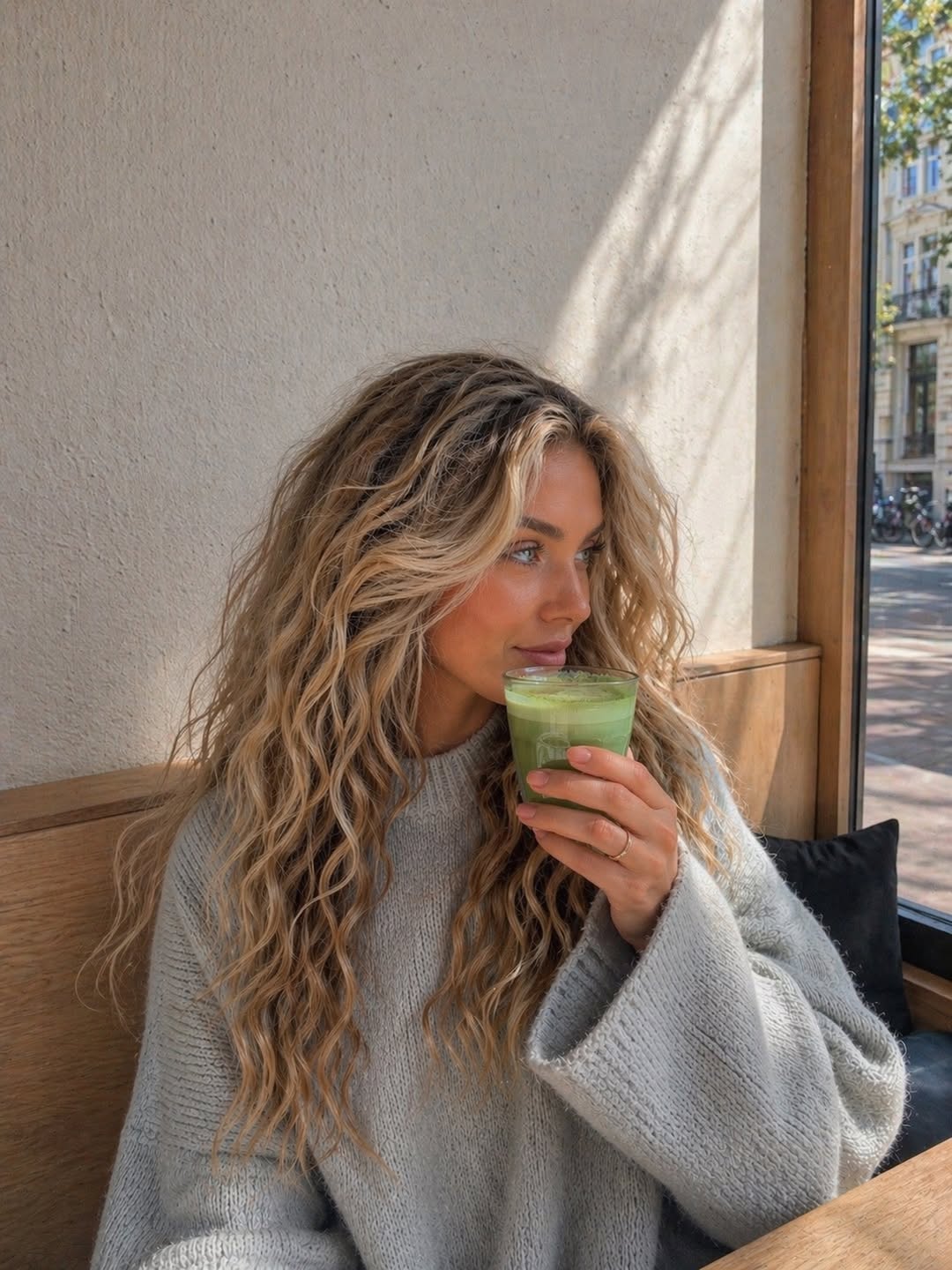 Golden Blonde Layered Curls With Face-Framing Waves