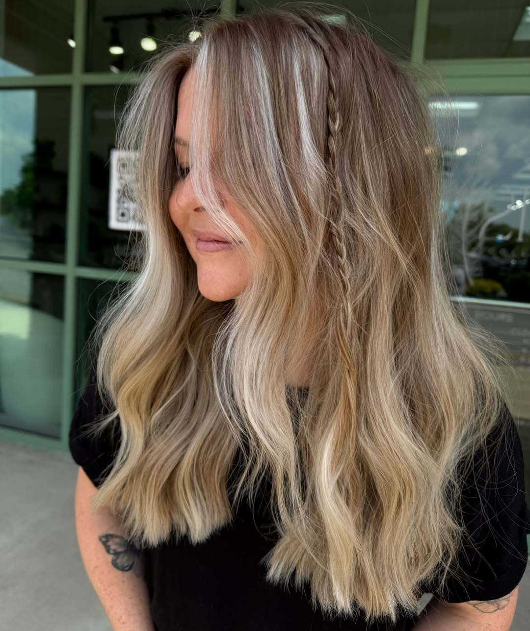 Golden Blonde Waves With Face-Framing Braids