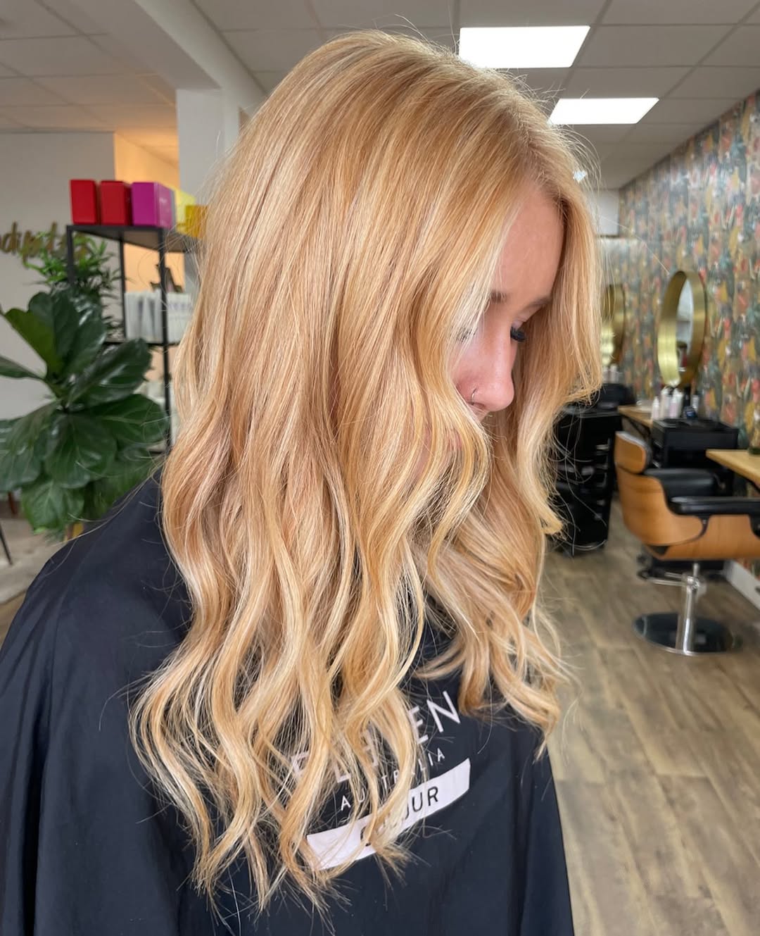 Golden Strawberry Blonde Waves With Face-Framing Layers