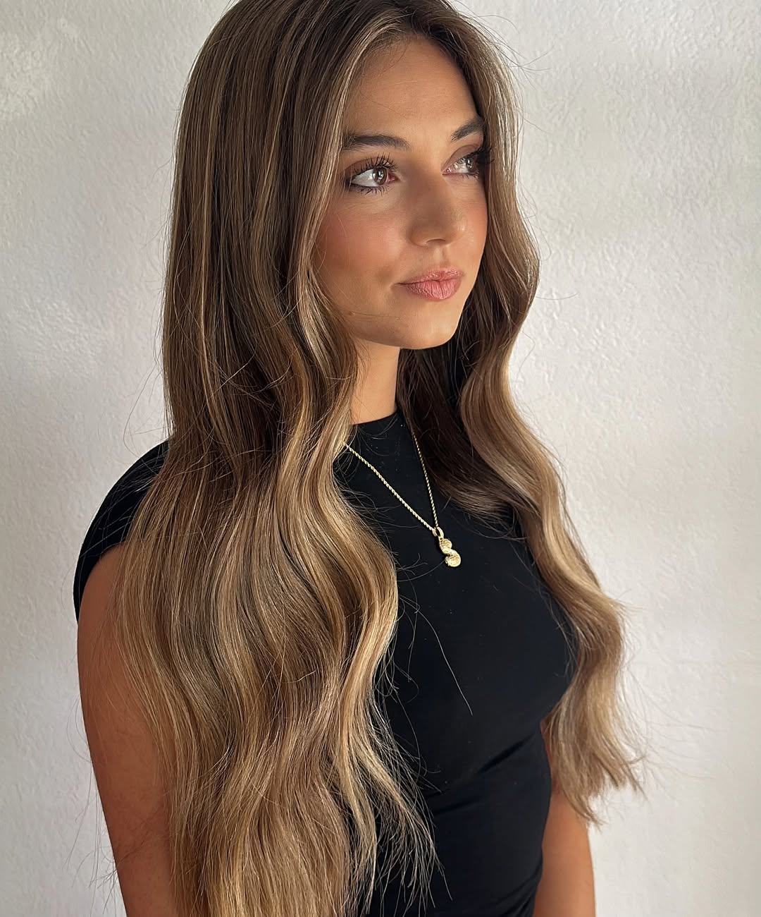 Golden Vanilla Beach Waves With Lived-In Brunette Lowlights