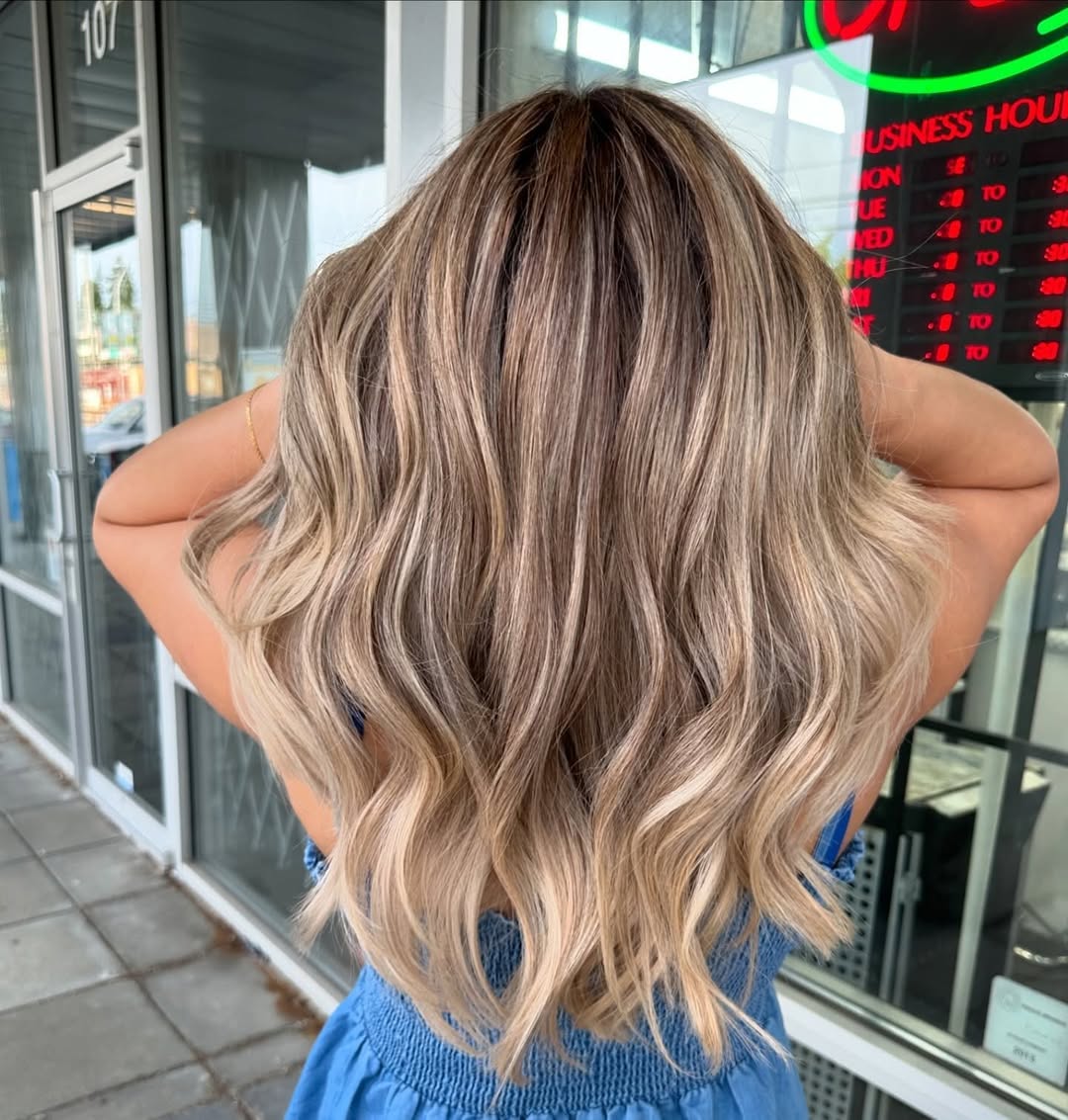 Gorgeous Dirty Blonde Balayage with Wavy Layers