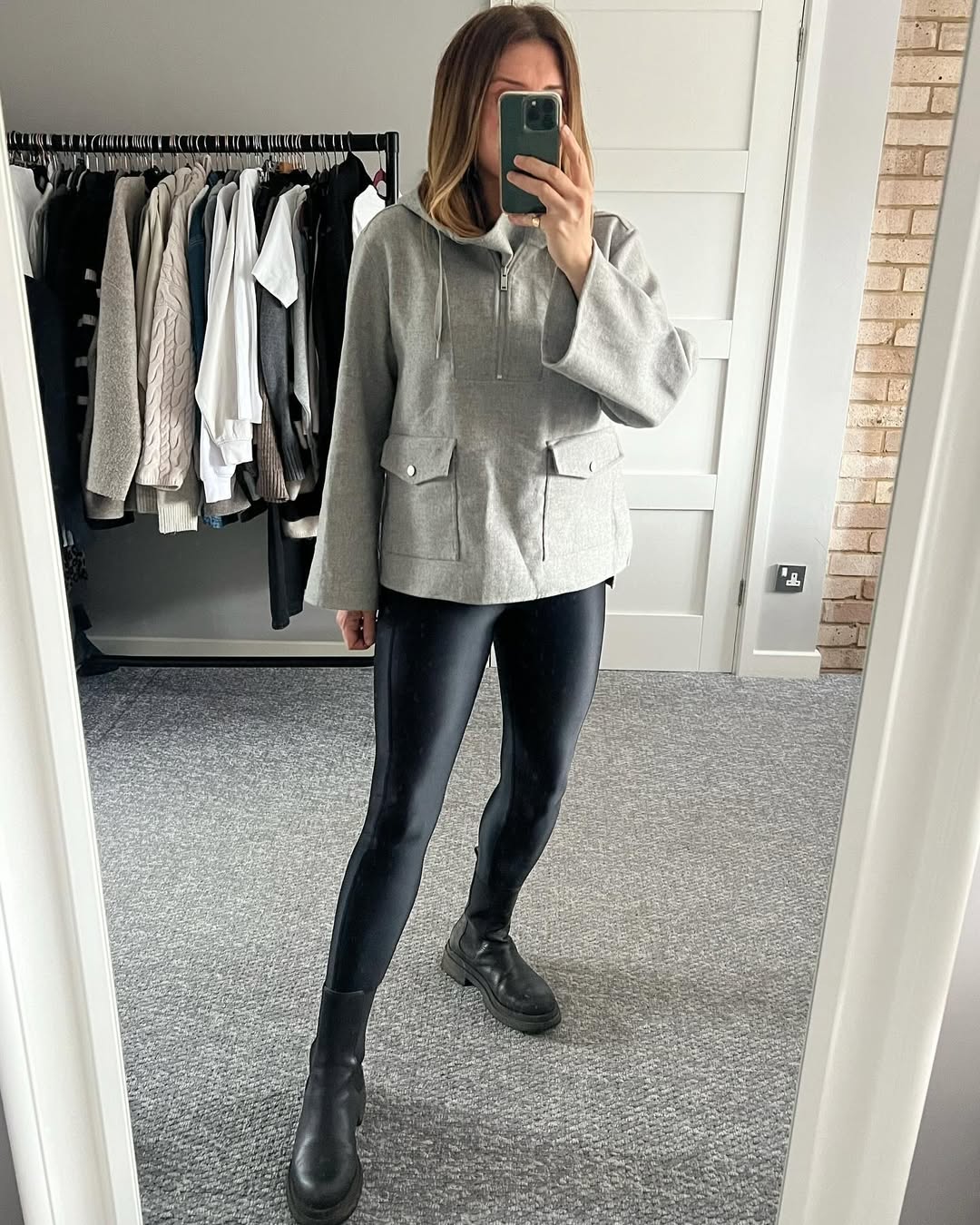 Grey Fleece Pullover And Black Shiny Leggings Look