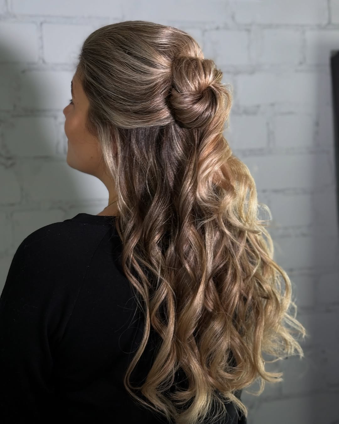 Half-Up Knot With Wavy Blonde Balayage