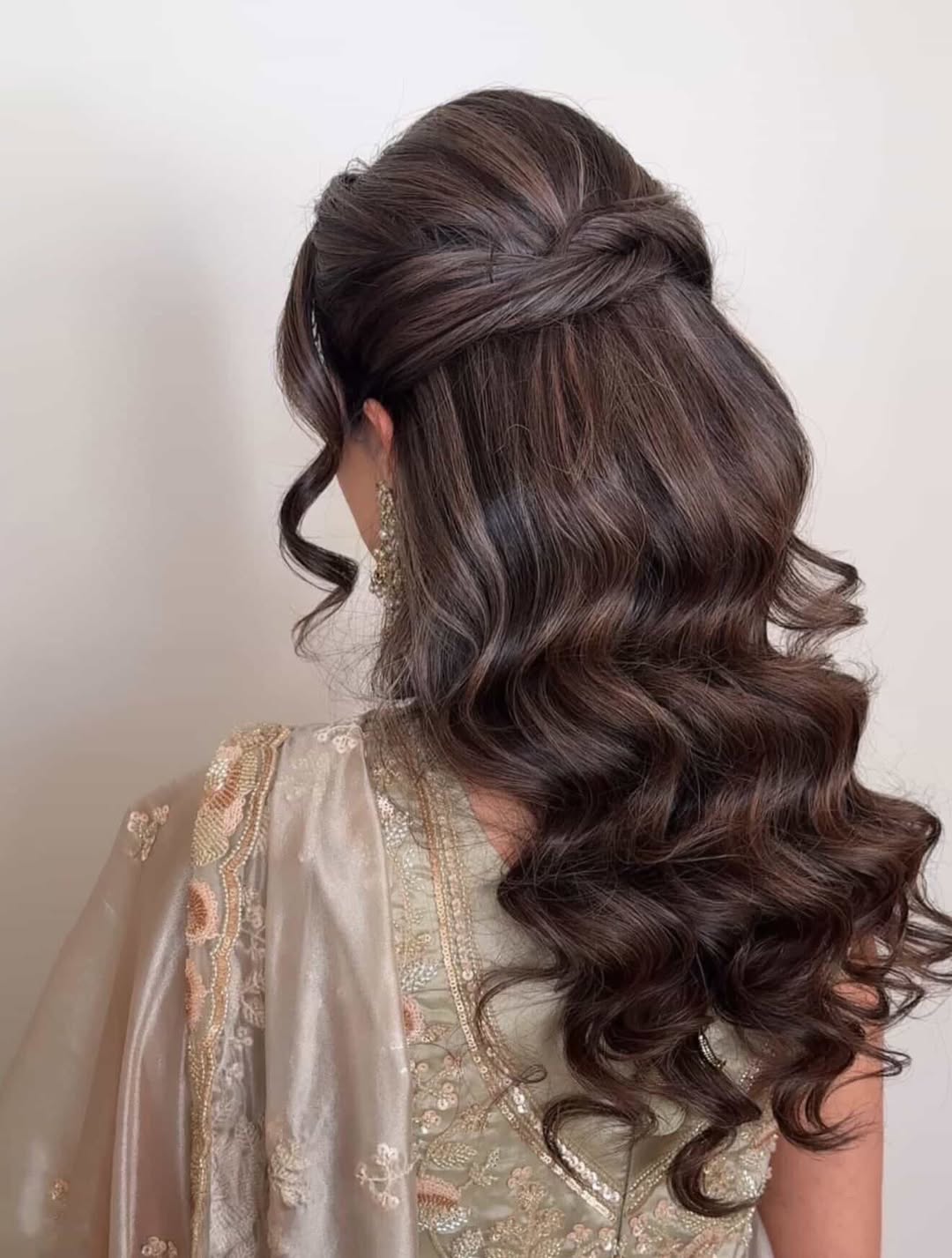 Half-Up Voluminous Curls With Face-Framing Tendrils