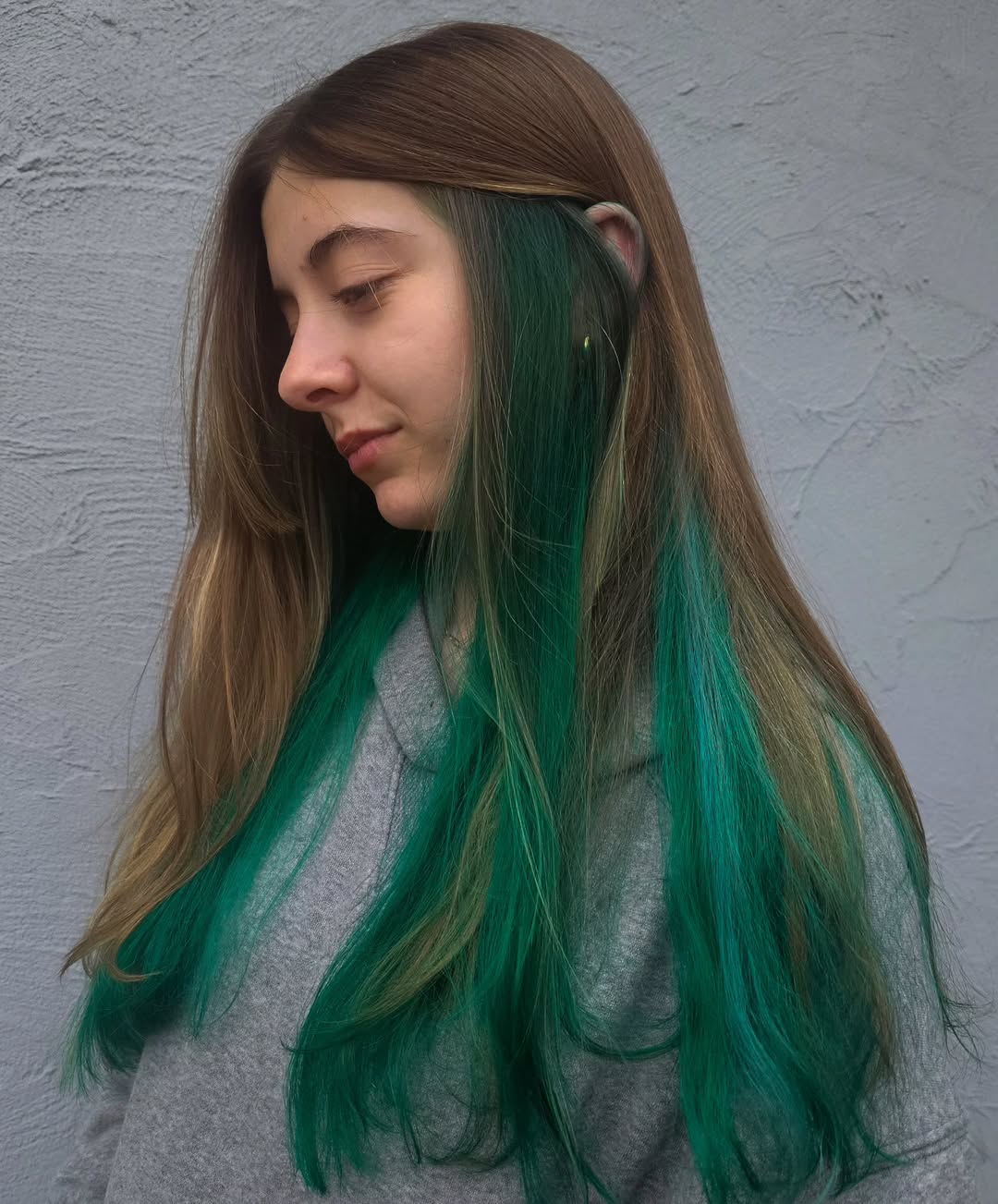 Hidden Emerald Pop On Natural Brown Hair