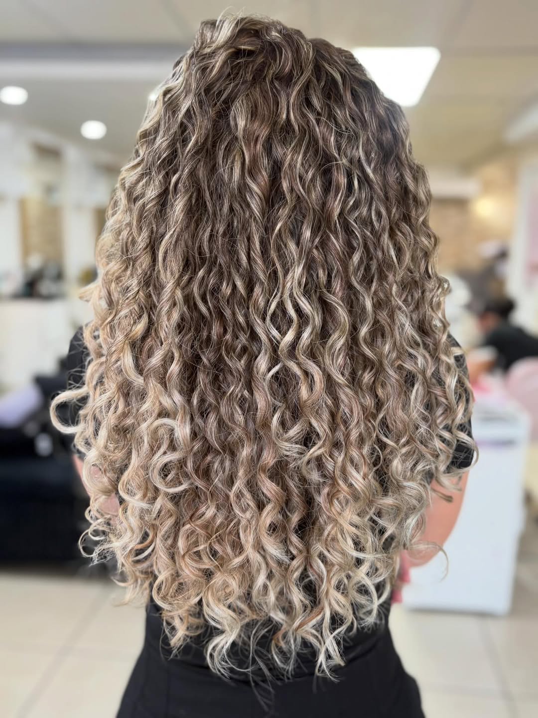 Honey Blonde Curly Balayage Mid-Back Length