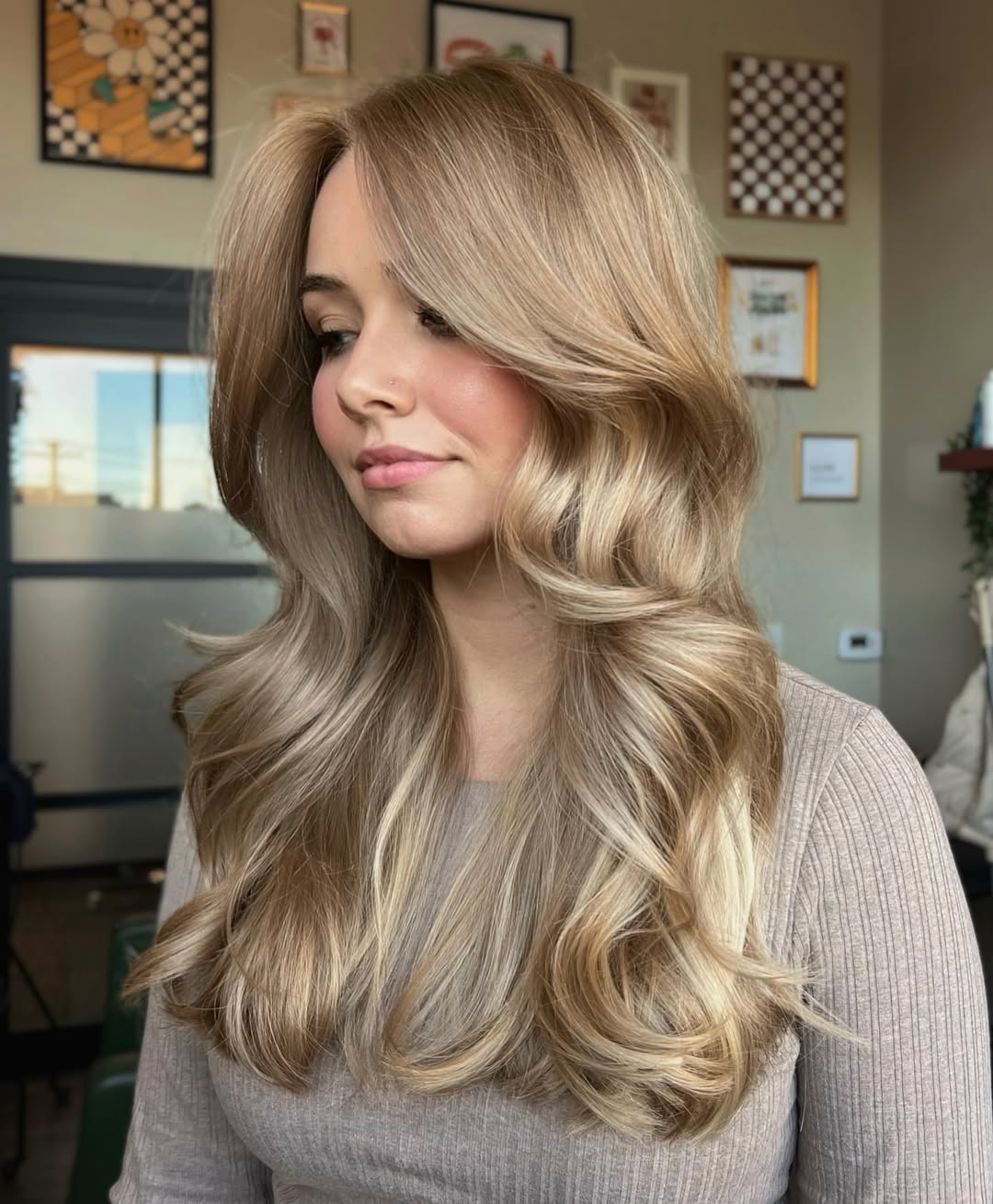 Honey Blonde Layers With Voluminous Blowout Styling