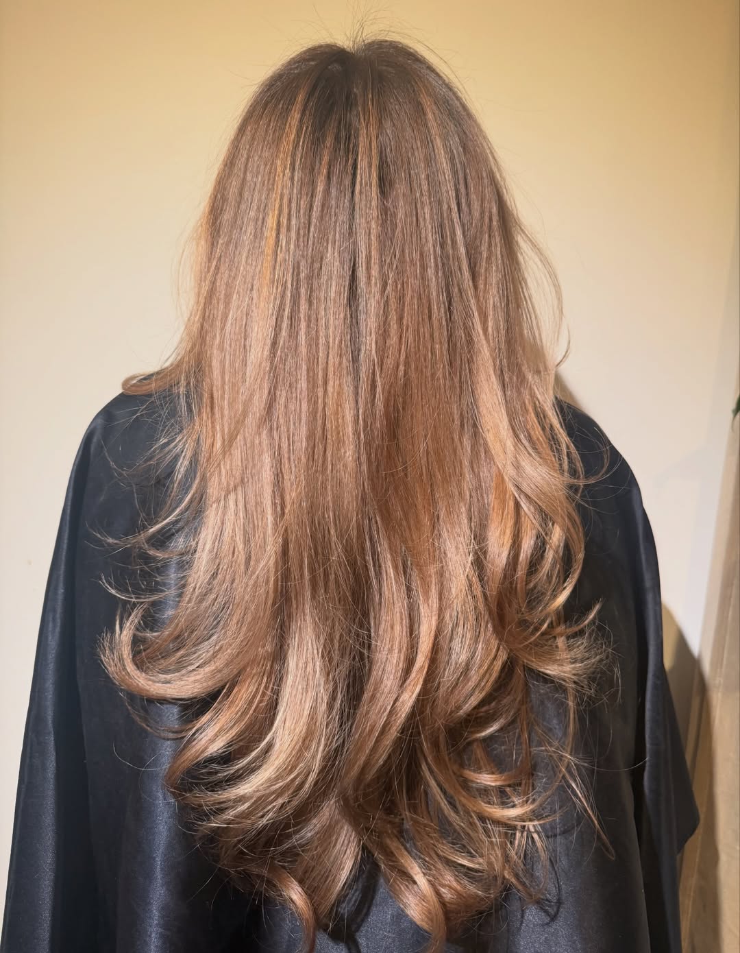 Honey Brown Layered Hair With Bouncy Waves