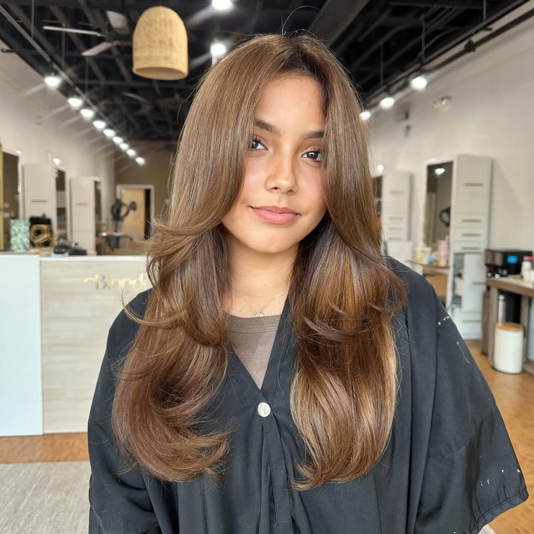 Honey Brown Layers With Face Framing Bangs