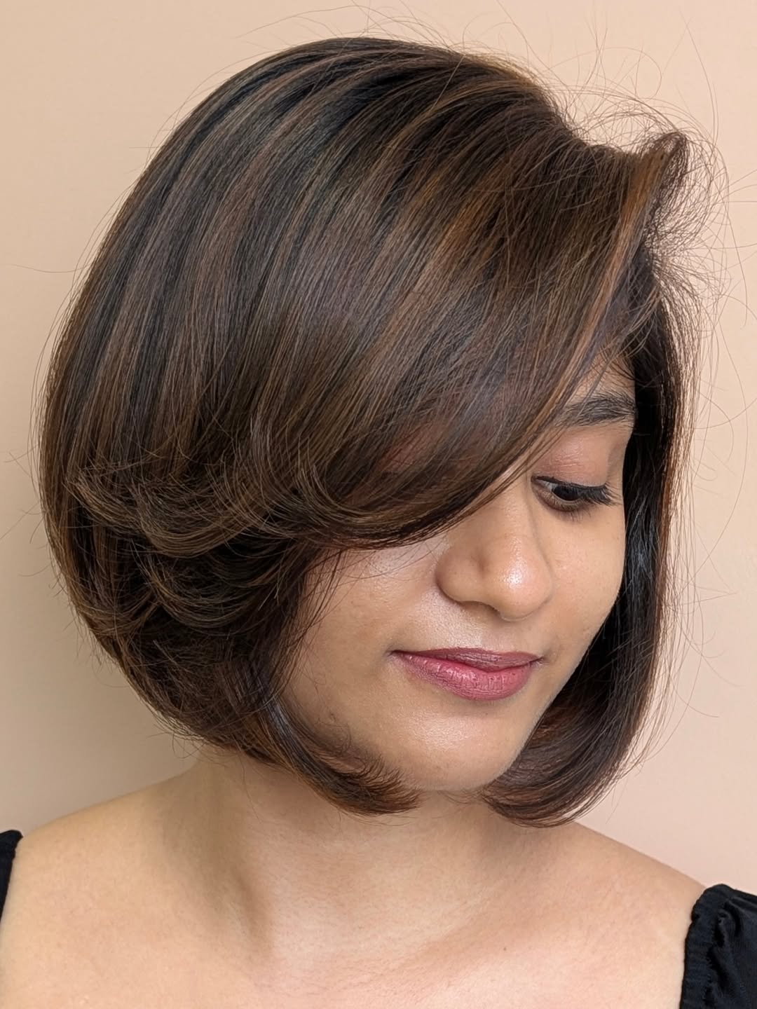 Layered Bob With Subtle Honey Blonde Highlights