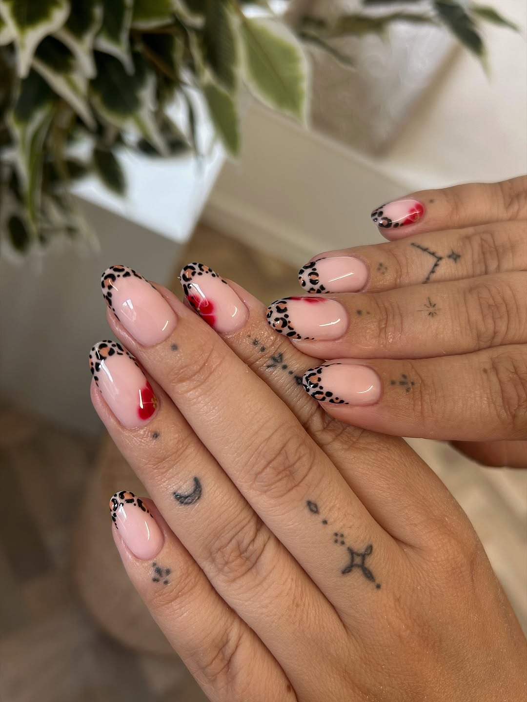 Leopard Print and Red Heart Accent Almond Nails