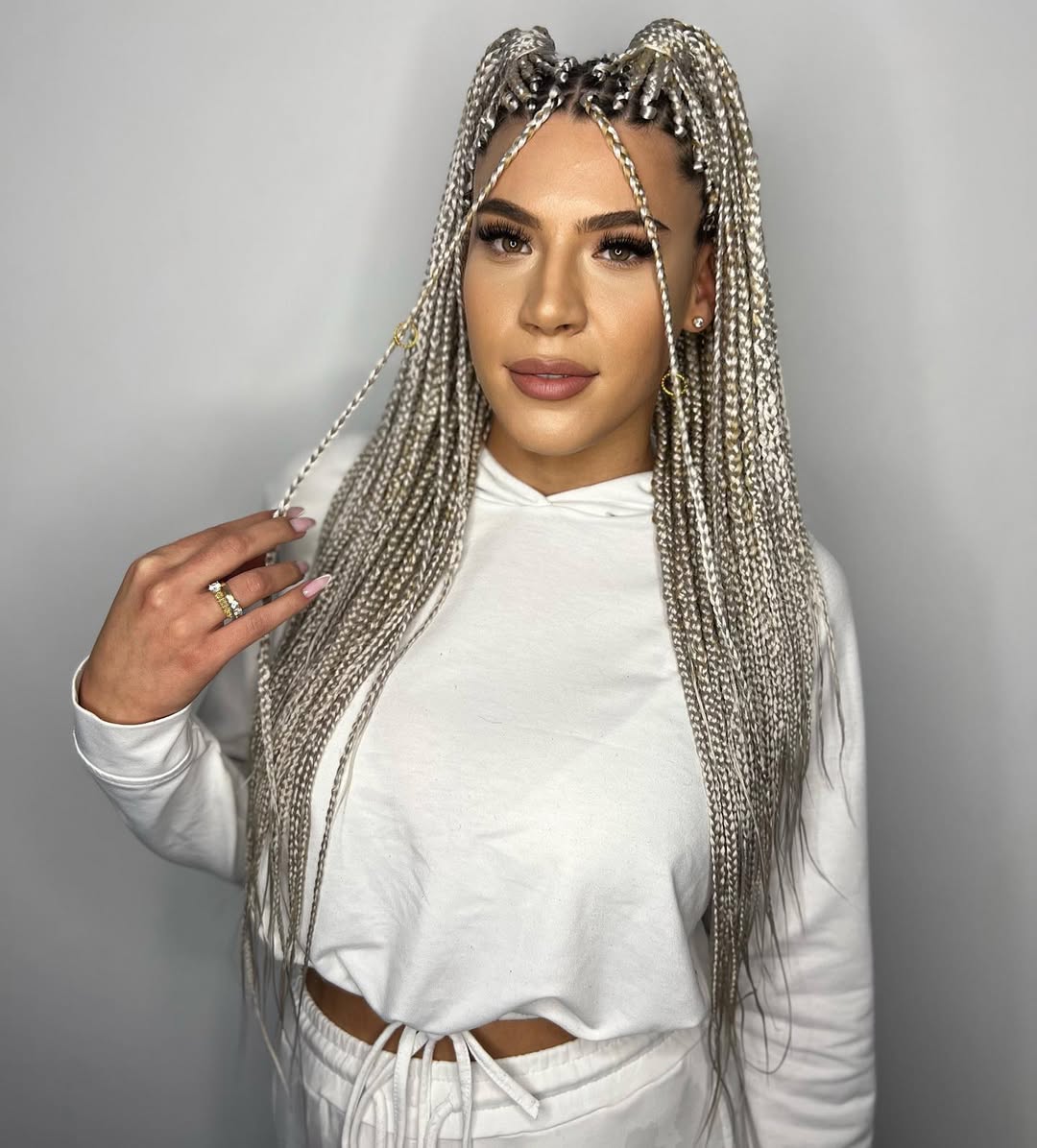 Long Platinum Box Braids With Gold Cuffs