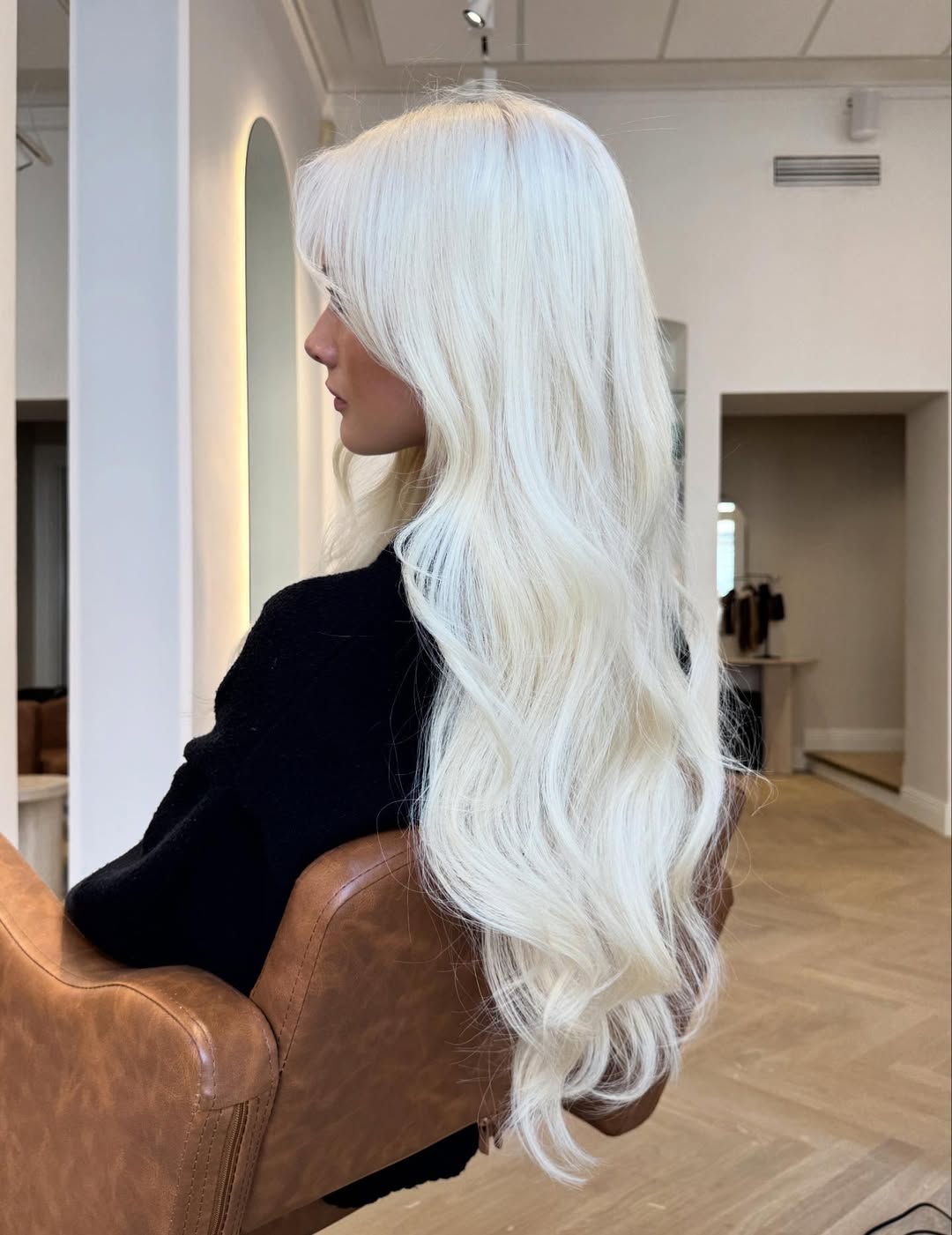 Long Wavy Platinum Blonde Layers With Face Frame