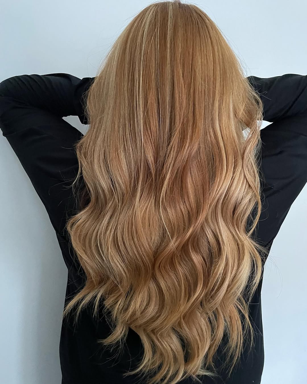 Long Wavy Strawberry Blonde With Subtle Highlights