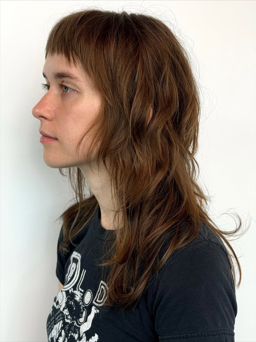 Modern Shag With Micro Bangs And Wavy Layers
