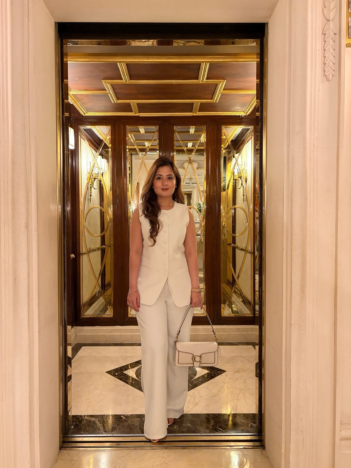 Monochromatic Cream Vest And Wide Leg Trouser Outfit