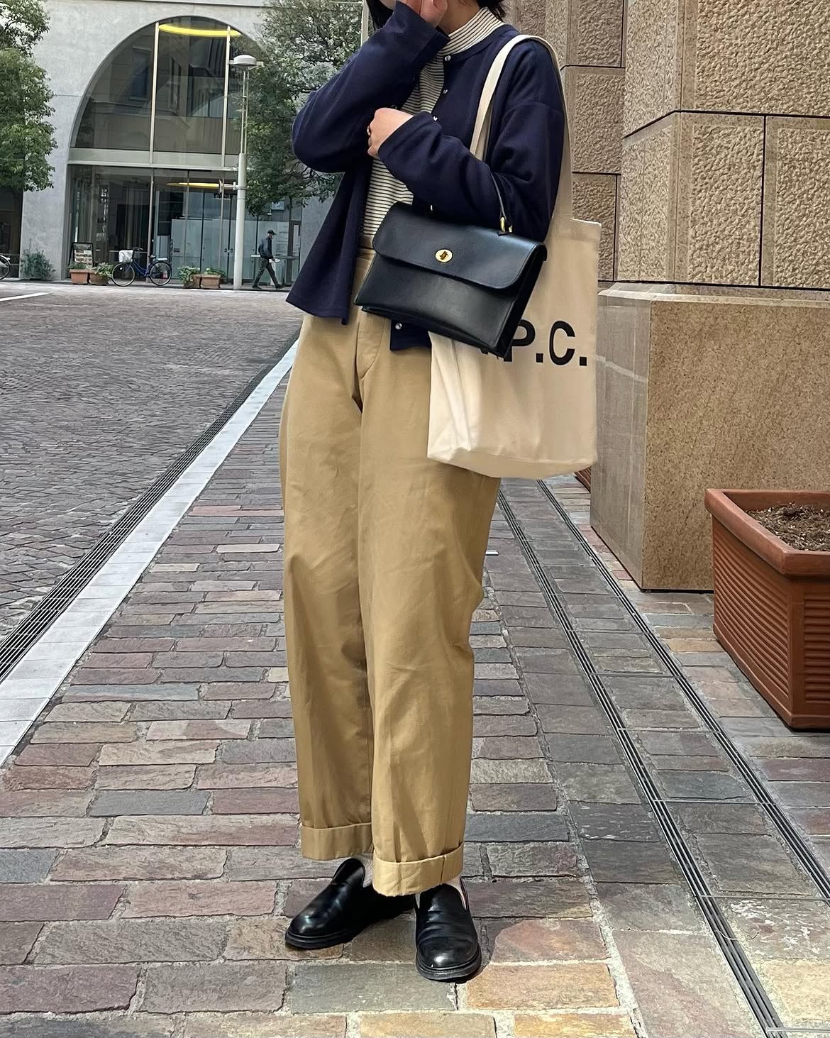 Navy Cardigan With Khaki Wide-Leg Trousers And Loafers