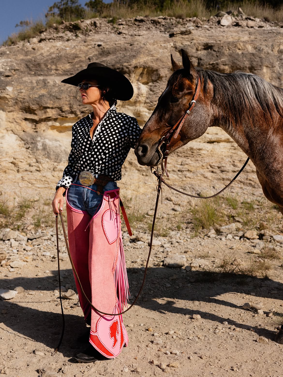 Pink Suede Chaps With Polka Dot Shirt And Cowboy Hat