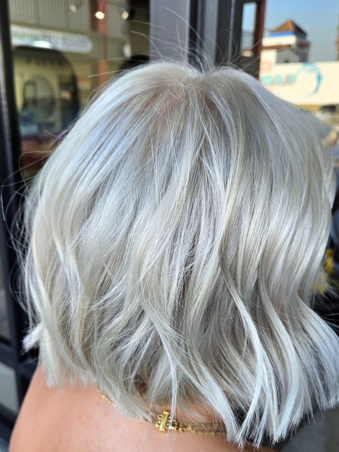 Platinum Blonde Chin-Length Bob With Soft Waves