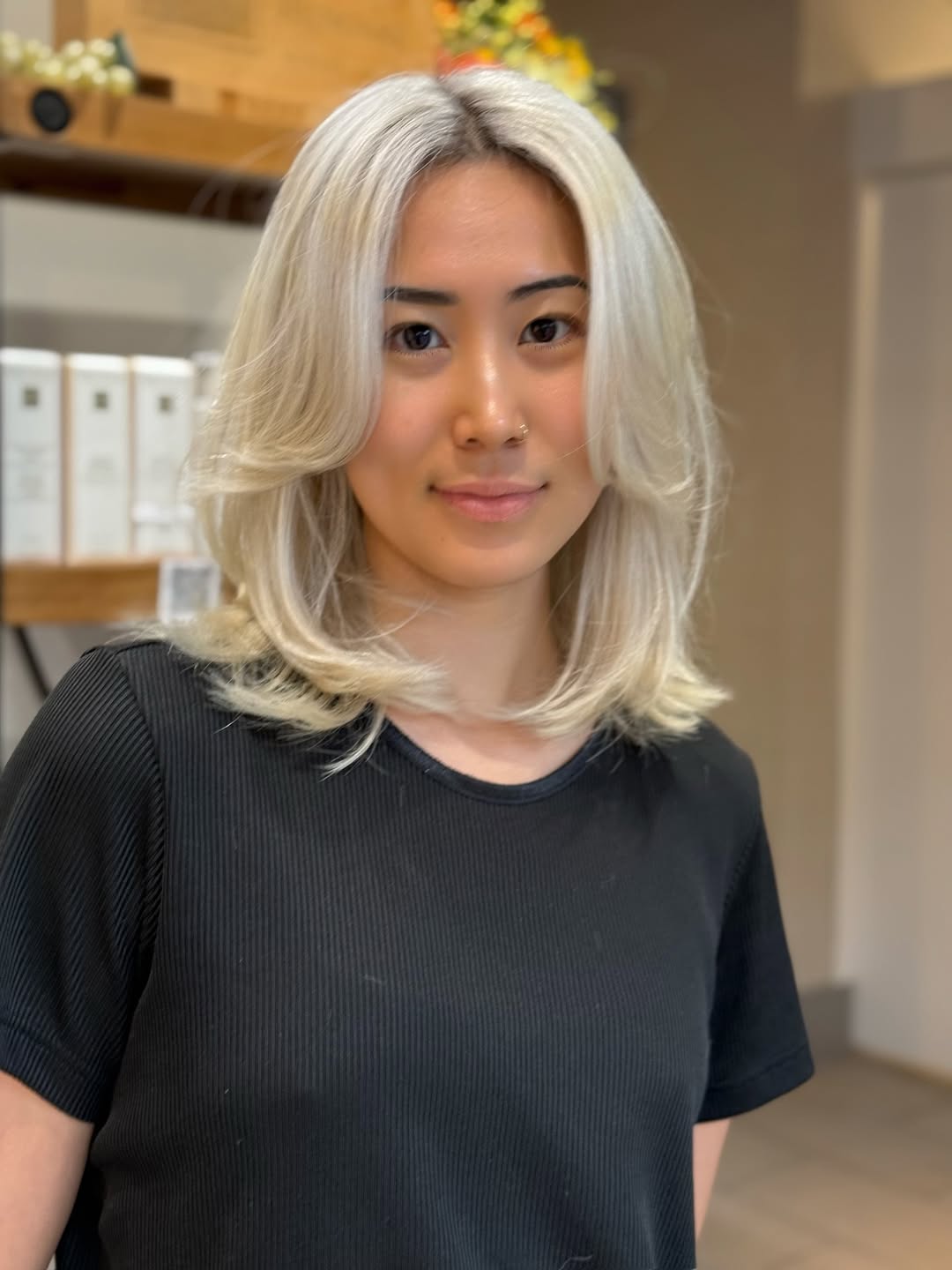 Platinum Blonde Layers with Face Framing Bangs