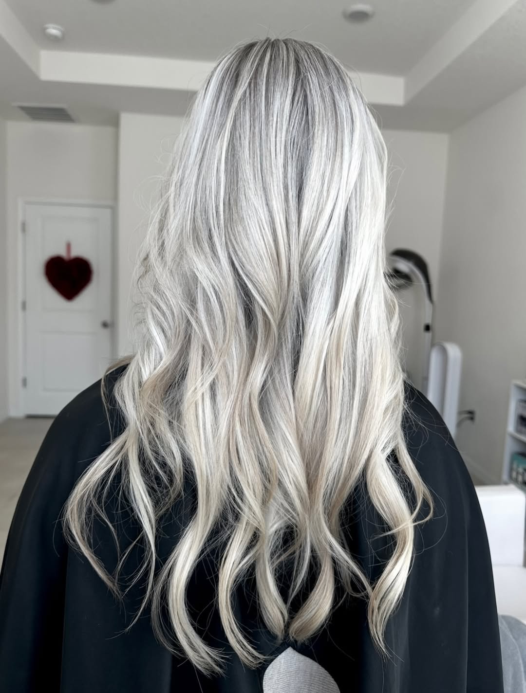 Platinum Blonde Mid-Back Waves With Shadow Roots
