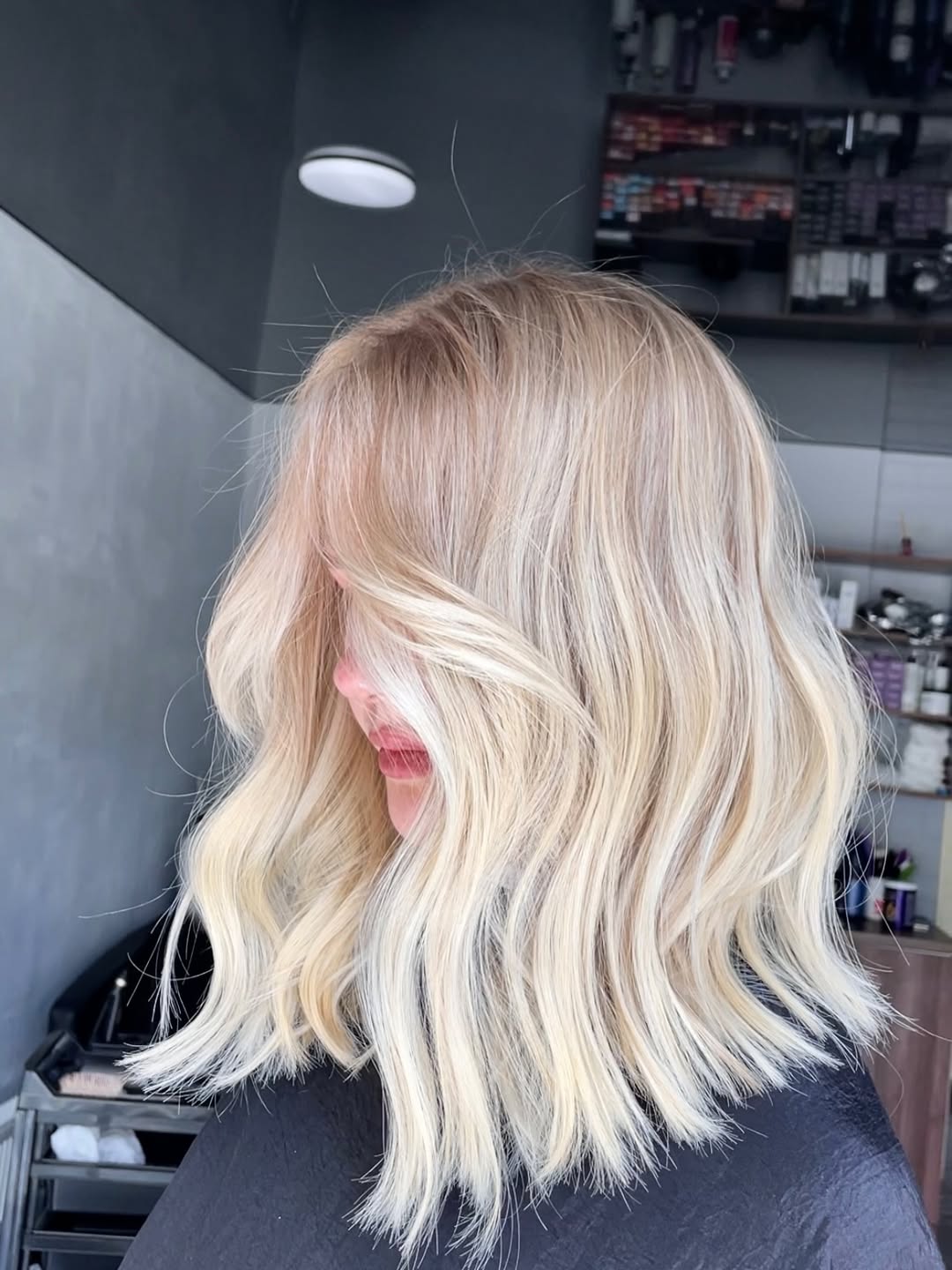 Platinum Blonde Wavy Lob With Wispy Fringe