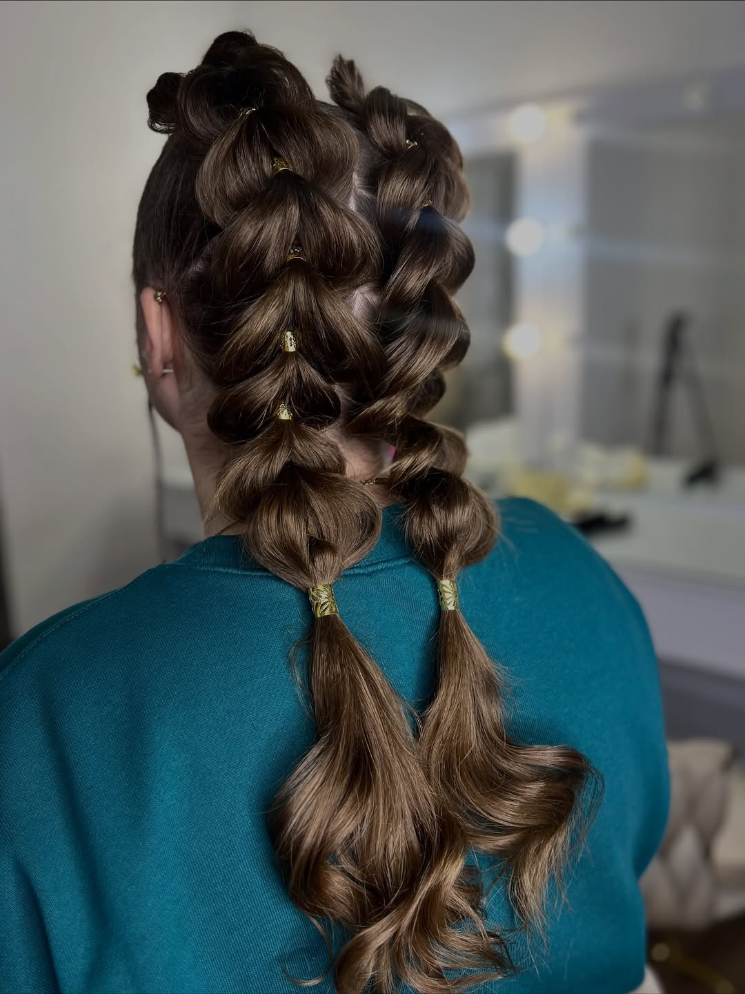 Playful Bubble Braids With Gold Accents