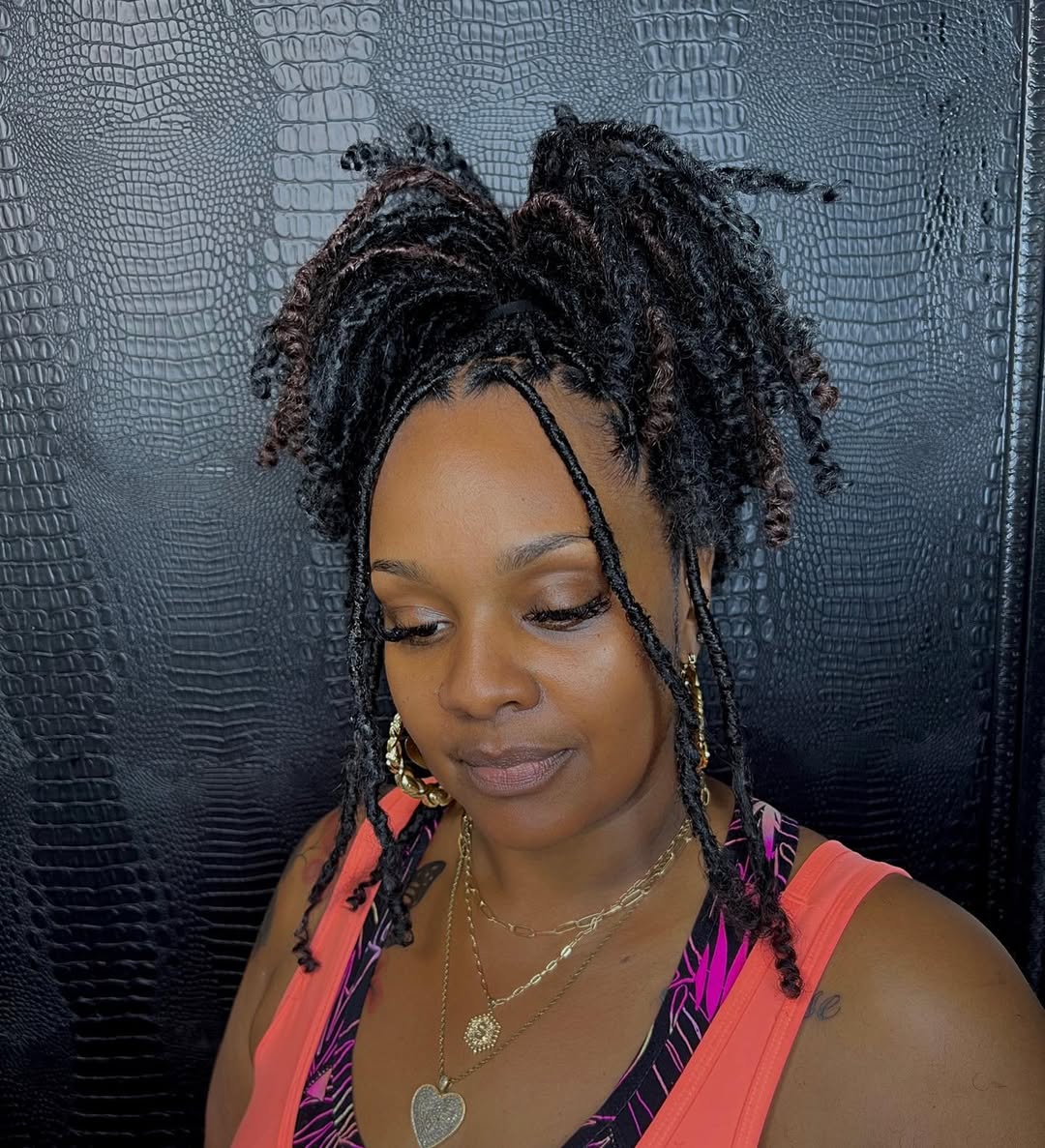 Playful Micro Locs Updo With Loose Face Framing
