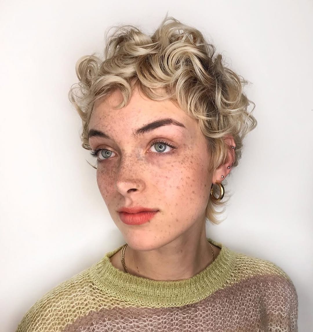 Playful Pixie Cut With Honey Blonde Curls