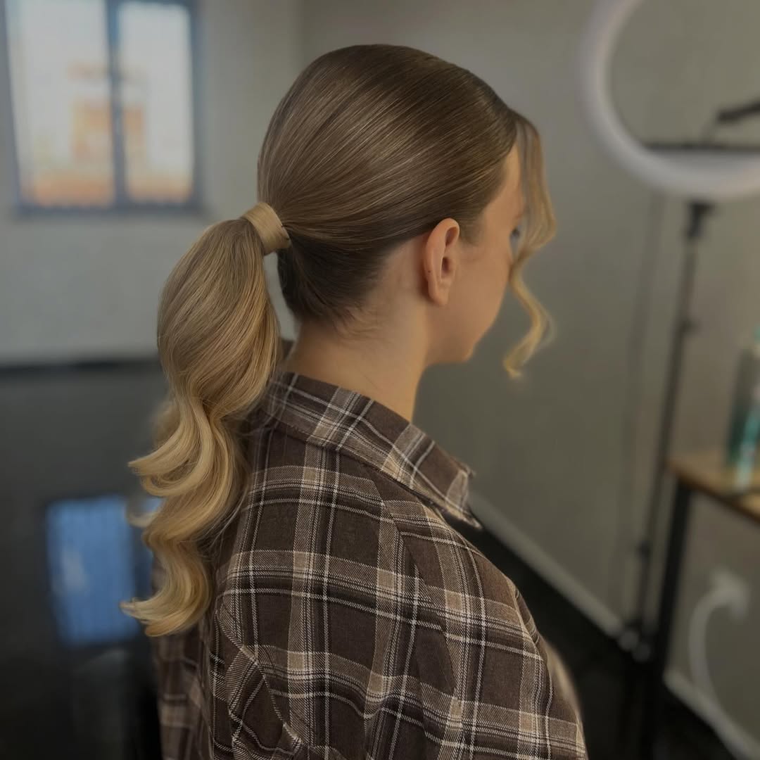 Polished Mid Ponytail With Loose Face Framing