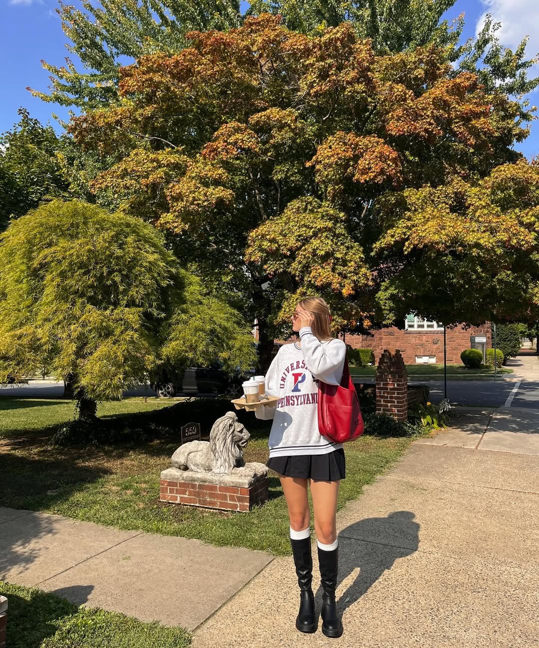 Preppy Collegiate Sweatshirt And Mini Skirt Look