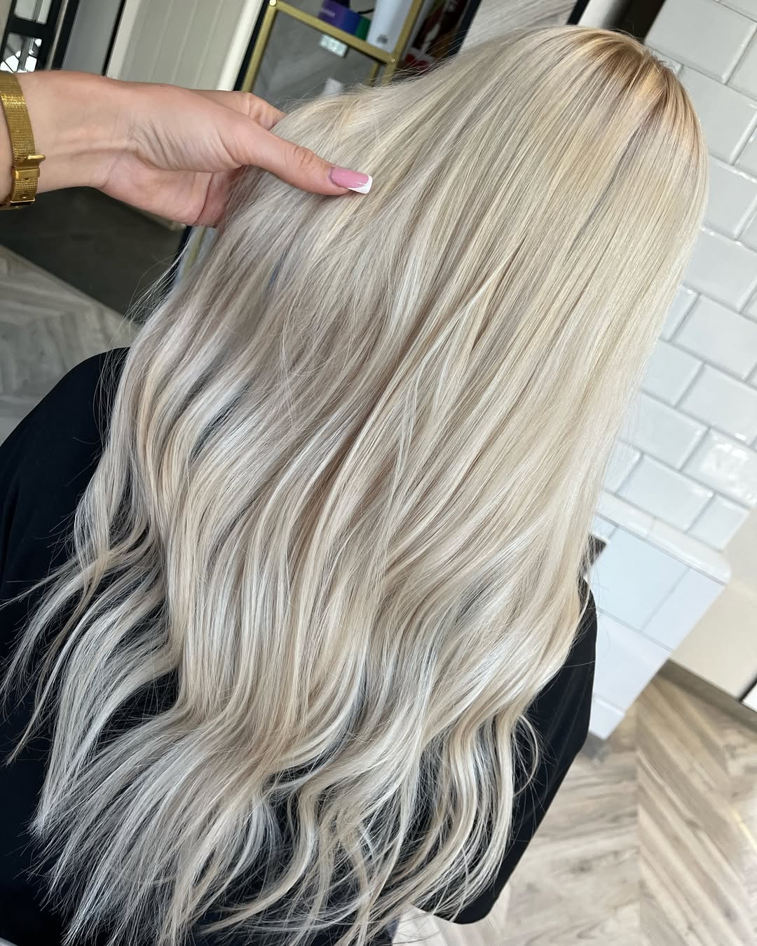 Radiant Platinum Blonde Waves With Shadow Root