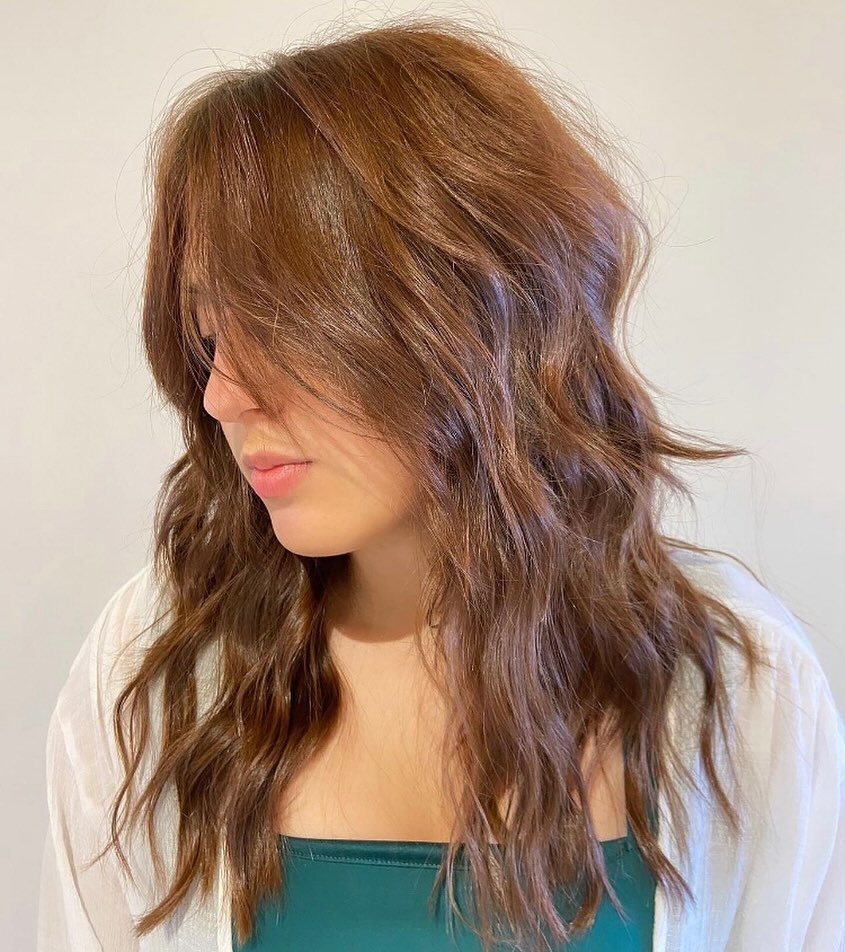Relaxed Auburn Shag With Wavy Layers And Fringe