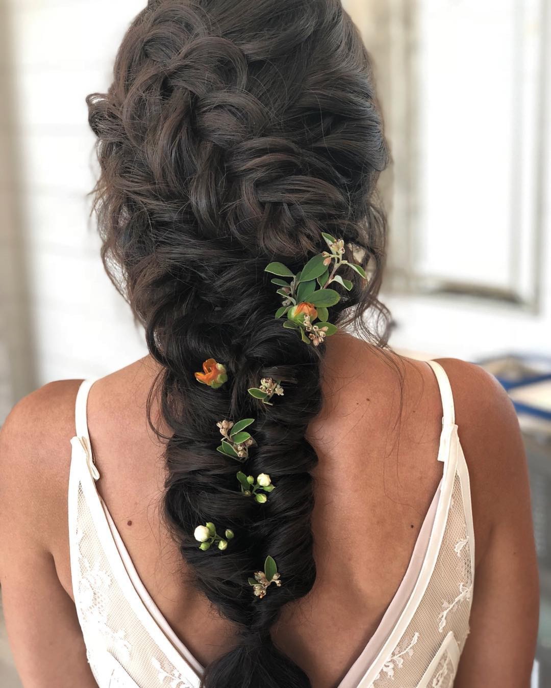 Relaxed Bohemian Waterfall Braid with Floral Adornments