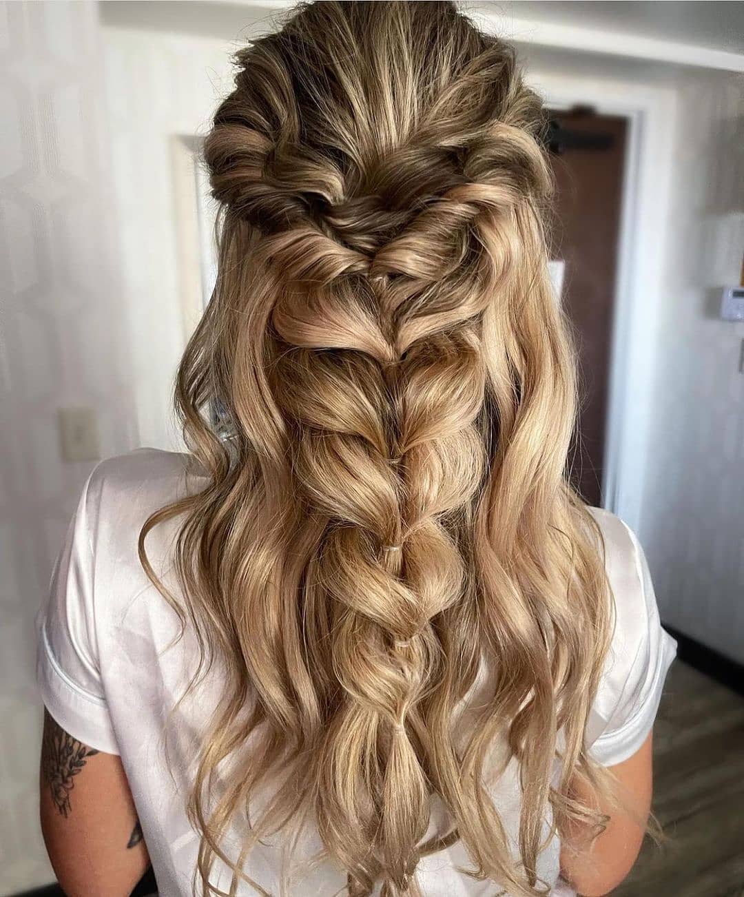 Relaxed Boho Braided Hairstyle on Wavy Blonde Hair