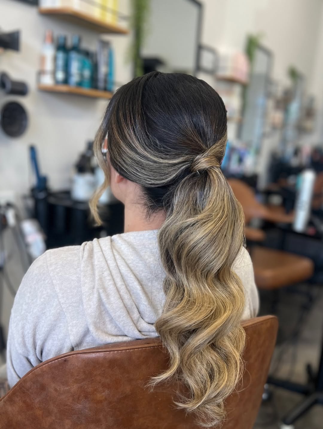 Relaxed Low Ponytail With Wavy Honey Blonde Balayage