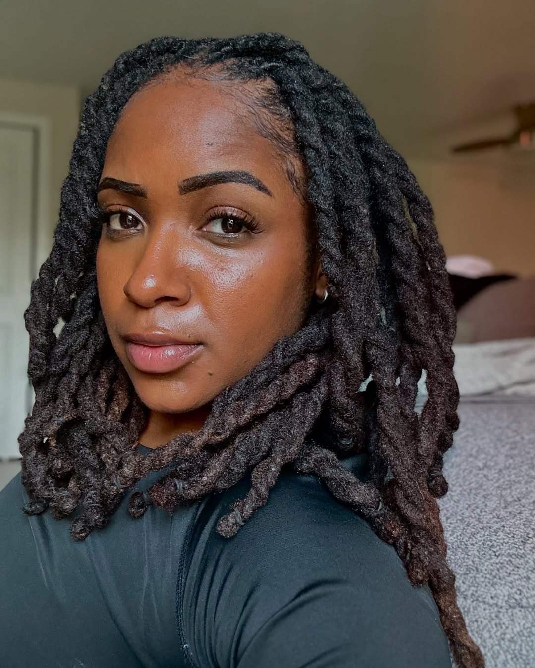 Relaxed Shoulder-Length Locs With Subtle Color