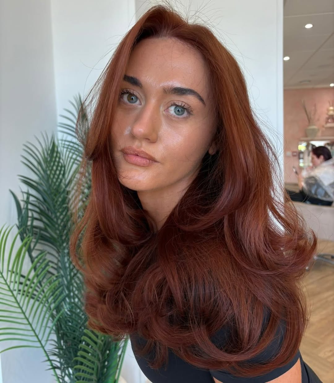 Rich Auburn Waves With Face-Framing Layers