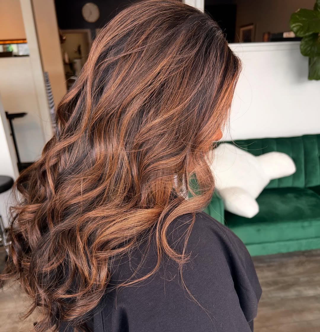 Rich Brunette Highlights With Voluminous Waves