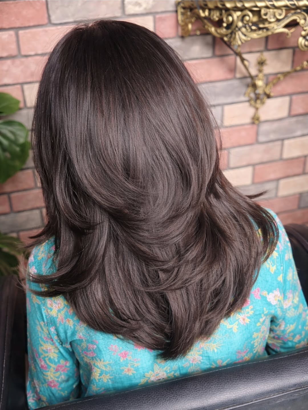 Rich Brunette Medium Length Layered Haircut