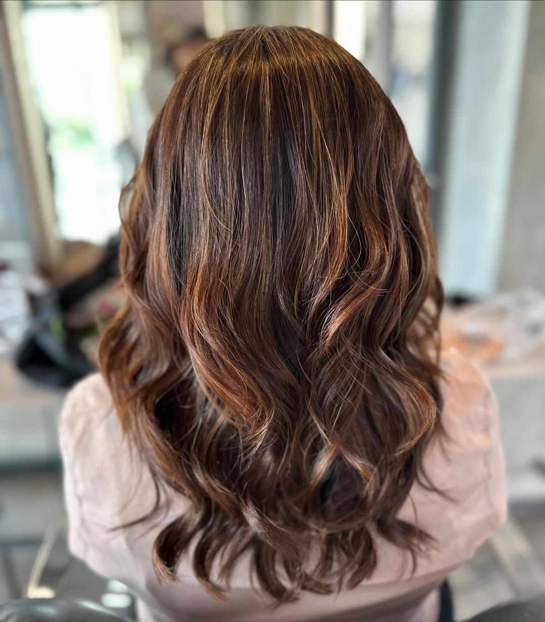 Rich Brunette With Caramel Highlights Wavy Layers