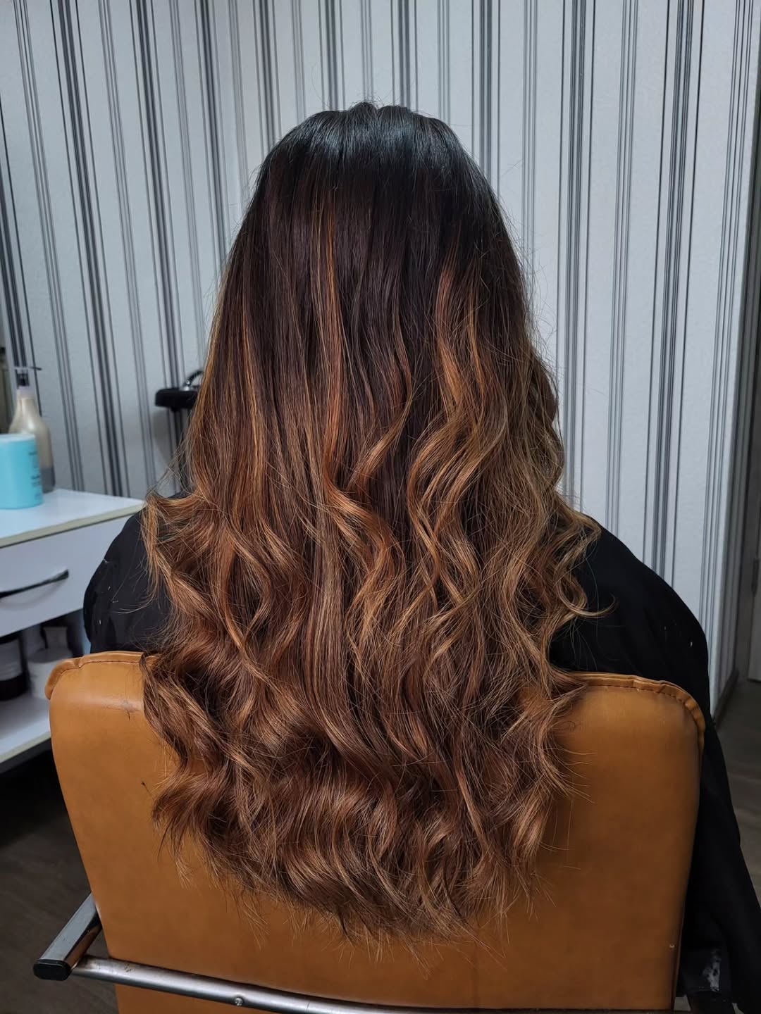 Rich Brunette With Warm Caramel Balayage Waves